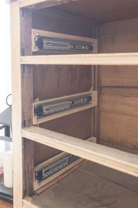 installation of bottom bracket metal desk drawer|inserting drawer slides into cabinet.